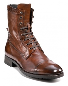 Heritage style infuses this updated combat boot, with its burnished leather upper, peak tongue and classic cap toe