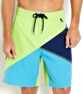 Flag it. Stand out in the surf in these comfortable boardshorts from Nautica.