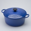 Le Creuset 2.75-qt. round French oven. This enameled cast iron casserole goes easily from oven or stovetop to the table. Ideal for cooking and re-heating risotto, soups, stew, and for simmering or slow-cooking foods. Secure lid seals in moisture and flavor. Retains heat well and is beautiful enough for tabletop serving. Features sturdy, cast handles and is oven-safe to 450 degrees.