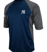 At home or on the road, show your true colors and support your favorite team with this color-blocked MLB New York Yankees shirt from Majestic.