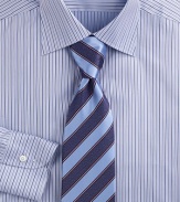 A suit-defining silk tie crafted with wide stripes. Silk Dry clean Made in Italy 