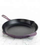 A classic kitchen workhorse, Le Creuset's heavyweight skillet is a culinary tradition crafted to sear and fry with professional precision. The expertly enameled cast iron exterior ensures uniform heating and even cooking, while the satin black enamel interior seals in juices and flavors. Limited lifetime warranty.