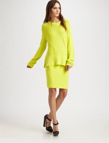 Vibrant cotton-knit look with a ribbed elastic waistband and semi-fitted silhouette. Ribbed elastic waistbandAbout 22 long96% cotton/3% nylon/1% spandexHand washImported