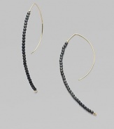 A striking modernist shape strung with oxidized sterling silver beads capped with 14k yellow gold beads.14k yellow gold Oxidized sterling silver Length, about 2¾ Pierced Made in USA