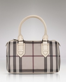 Burberry's signature check lends luxe style to the classic bowling bag silhouette.