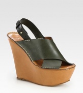 Held in place by an adjustable slingback strap, this luscious leather wedge joins a contrasting leather upper. Self-covered wedge, 5 (125mm)Covered platform, 2 (50mm)Compares to a 3 heel (75mm)Leather upperLeather lining and solePadded insoleMade in ItalyOUR FIT MODEL RECOMMENDS ordering one half size up as this style runs small. 