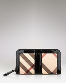 A chic zip-around wallet in Burberry's signature check with contrasting glossy patent trim.