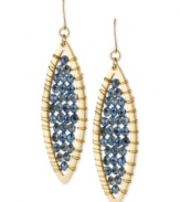 A stunning display takes shape in this pair of oval drop earrings from Kenneth Cole New York. Crafted from gold-tone mixed metal, the earrings dazzle with striking blue cherry beads in the center. Approximate drop: 2-1/2 inches.