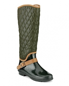 Rain, rain, come and stay. We want to splash around in these quilted rain boots, finished with a chic strap. By Sperry Top-Sider.