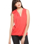 Decorated with a fabric flower, RACHEL Rachel Roy's top brings new life to a relaxed surplice silhouette.