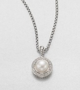 From the Petite Albion Collection. An elegant pearl surrounded with dazzling diamonds set in sleek sterling silver on a box link chain. PearlSterling silverDiamonds, .21 tcwLength, about 17Lobster clasp closureImported