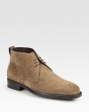 This lace-up chukka exudes casual cool, rendered in a rich suede with a supportive rubber sole for maximum comfort.Ankle pull tabSuede upperLeather liningPadded insoleRubber soleMade in Italy