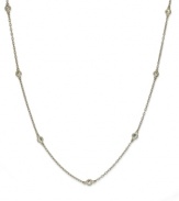 Inch by inch of luminous sparkle. B. Brilliant's delicate necklace features eleven round-cut cubic zirconia stations (1-1/10 ct. t.w.) set in 18k gold over sterling silver. Approximate length: 36 inches.