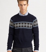 A modern style Nordic print pattern defines the body and shoulders of a cozy sweater knitted in superior wool.CrewneckRibbed knit collar, cuffs and hemWoolDry cleanImported