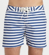 Summertime essential in a crisp, cotton blend finished in bold stripes for a nautical-inspired feel.Drawstring-tie waistSide slash, back welt pocketsInseam, about 465% cotton/35% nylonMachine washImported