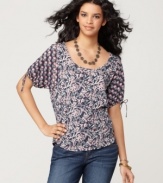 This Lucky Brand Jeans top is an easy, everyday basic with bohemian-inspired charm, thanks to a painted floral print. Rendered from a lightweight cotton blend, it's made for warmer days, too!