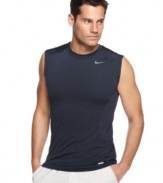 In motion. Stay going strong with this fitted sleeveless t-shirt from Nike featuring Dri-Fit technology.