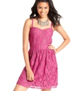 Flourished with metallic accents and a sweet, floral pattern, this sleeveless party dress from BeBop totally charms.