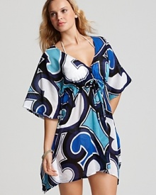 This versatile tunic from Echo is the ultimate in breezy beachwear. Boasting floaty sleeves, this coverup feels bohemian with flat sandals and an armful of beads.