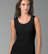 Soft, seamless stretch knit with a hint of shimmer. Banded neckline and hem Cotton/nylon/elastene Machine wash Imported