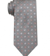 Small, but mighty. This neat-patterned skinny tie from Bar III instantly pulls together your work look.