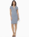 Chic rope accents and bold variegated stripes lend sophisticated nautical style to a Lauren Ralph Lauren hooded dress, constructed in ultra-soft cotton jersey for stylish comfort and versatility.