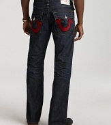 Red stitching is a fierce touch on on these True Religion jeans with straight legs in a deep, dark wash.