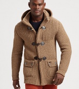 Made in Florence from the finest tweed yarn, this extra-chunky knit sweater has a removable hood and horn toggles, so it can double as a coat.Button-frontAttached hoodWaist flap pocketsRibbed knit cuffs and hemAbout 29 from shoulder to hem80% wool/20% nylonHand washMade in Italy