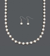 The perfect pairing for everlasting style. Every girl needs a cultured freshwater pearl (8-9 mm) and sterling silver necklace and earrings set in her collection. Approximate length: 18 inches. Approximate drop: 1-1/4 inches.