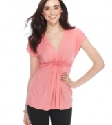 Ruffles and ruching at the empire waist add feminine flair to this Studio M top!