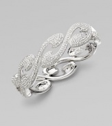 EXCLUSIVELY AT SAKS. Dazzling wave-shaped swirls set with pavé crystals form a head-turning bangle bracelet.Crystal Rhodium plated Diameter, about 2¼ Hinged with push-lock clasp Imported