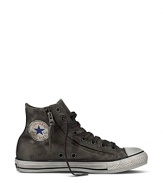 Finish off your rock 'n' roll style with classic Chuck Taylors, furnished with zippers on the side for extra edge.