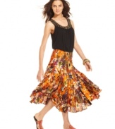 A bold print lends a festive feel to Grace Elements' flirty midi skirt! Pair with your favorite tanks or a chic twinset for a sophisticated touch.