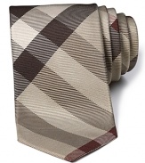 A signature check print tie from Burberry, handmade in England.