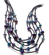 Rainbow-colored glass beads create a mesmerizing effect on this layered necklace from Style&co. Strung on a five-row fabric cord silhouette. Crafted in hematite tone mixed metal. Approximate length: 21 inches + 2-inch extender.