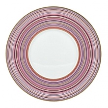 Inspired by Milleraies, Raynaud's spearhead tableware set, Attraction boasts a freer, more modern design with alternating narrow and wide stripes. It will embellish any table with its shades of pink and red, enhanced with mauve and orange and underscored subtle shades of green and brown.