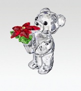 This year's Kris Bear is long on sparkle, richly faceted with the sweetest face, offering a colorful poinsettia plant as a holiday greeting.CrystalAbout 1.5H X 1WMade in Austria