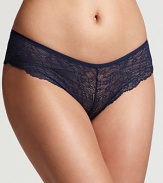 A sheer floral lace hipster with scalloped edge trim along legs and keyhole at back.