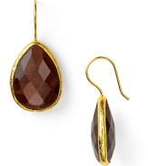 Make every look dazzle with Coralia Leets' striking tiger's eye teardrops. These 22-karat gold-rimmed earrings look effortless paired with slinky knits or something cocktail dressier.