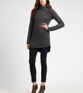 This chunky knit of wool and alpaca skims the body in an elongated silhouette.Turtleneck Raglan sleeves Shirttail hem Ribbed trim Pullover style 45% wool/25% alpaca/30% polyamide Dry clean Imported