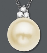 Poignant and polished. This simply stunning pendant features a cultured freshwater pearl (9 mm) accented by three, round-cut diamonds. Setting and chain crafted in 14k white gold. Approximate length: 18 inches. Approximate drop: 1/2 inch.