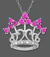 For the princess who loves pink. This crown pendant features vibrant round-cut pink sapphire (3/4 ct. t.w.) and sparkling diamond accents. Set in sterling silver. Approximate length: 18 inches. Approximate drop: 5/8 inch.