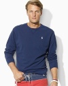 A comfortable, lightweight crewneck pullover is rendered in breathable cotton mesh for casual style.