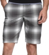 Standout on the course for both your swing and style in these performance plaid shorts from Puma.