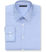 Solid dress shirt with spread collar, two button mitered cuffs. Modern fit through the body.