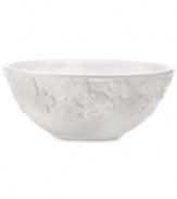 Embossed with a leaf and basketweave motif in white porcelain, Martha Stewart Collection vegetable bowls cater every meal with elegant charm.