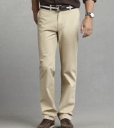 Create a long, lean line with these slim-fit chinos from Tommy Hilfiger.