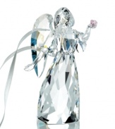 A classic symbol of peace, hope and light. This angelic beauty sparkles in fully faceted clear crystal with Crystal Moonlight wings. She holds a delicate rose in Light Rose crystal and her skirt is engraved with the year of issue 2011. Hang the angel on your tree or remove the white satin ribbon to create an elegant table decoration.