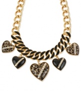 Wild at heart. This frontal necklace from Betsey Johnson is crafted from gold-tone mixed metal with with glass crystal and leopard print adorning black heart stones for a bit of animal attraction. Approximate length: 15 inches + 3-inch extender. Approximate frontal drop: 2-1/2 inches. Approximate heart drop: 1-3/4 inches.