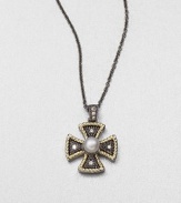 A Maltese cross in sterling silver and 18k gold accented with brilliant grey diamonds and a luminous pearl. Cultured freshwater pearlGrey diamonds, .1 tcwSterling silver18k goldLength, about 16Size, about 1Lobster clasp closureImported 